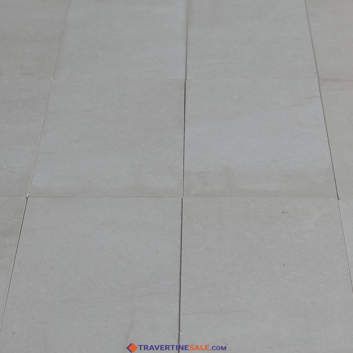perla bianco limestone tiles surface with honed and filled finish and white background